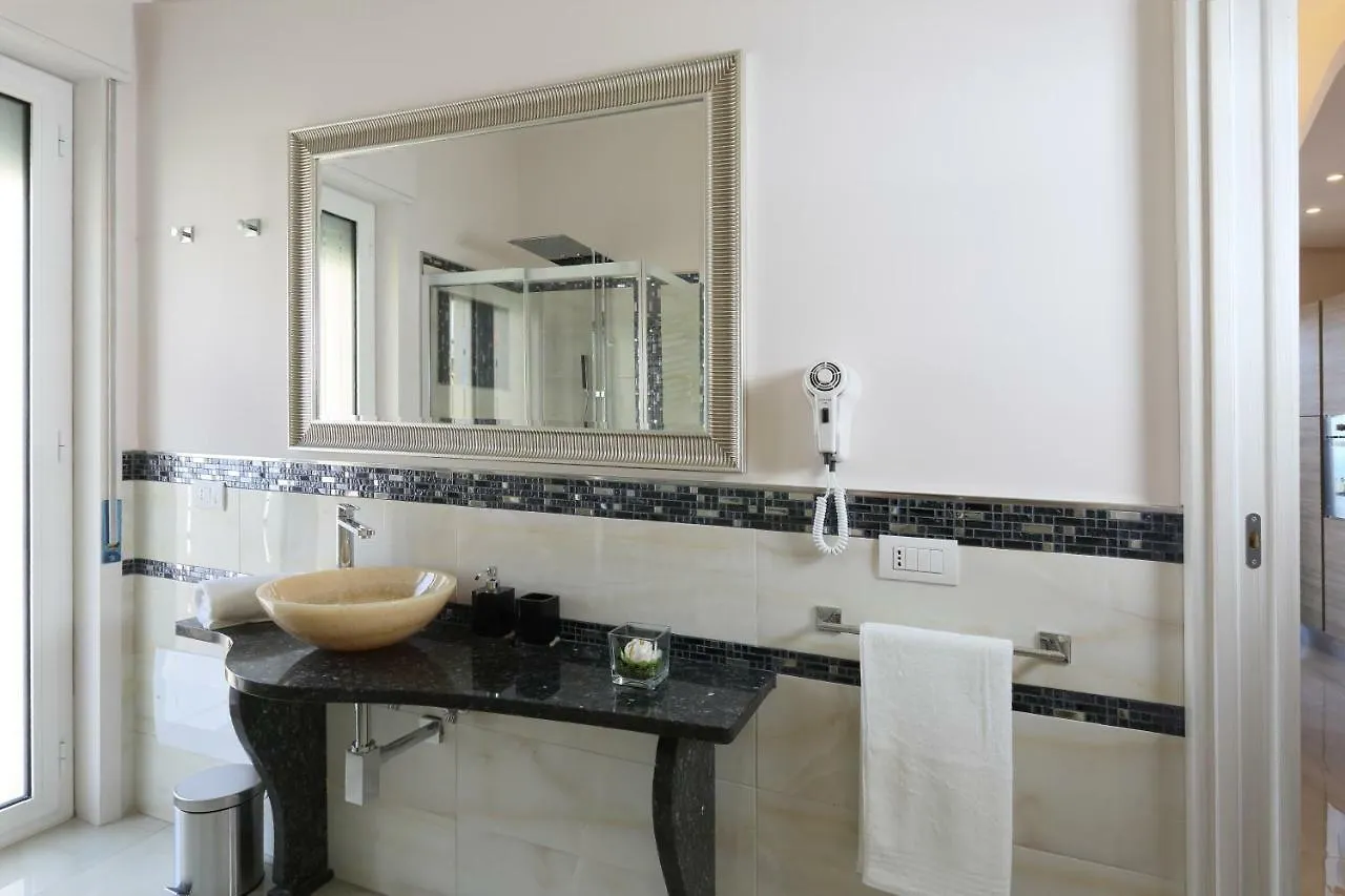 I Due Grifoni Apartments Таормина