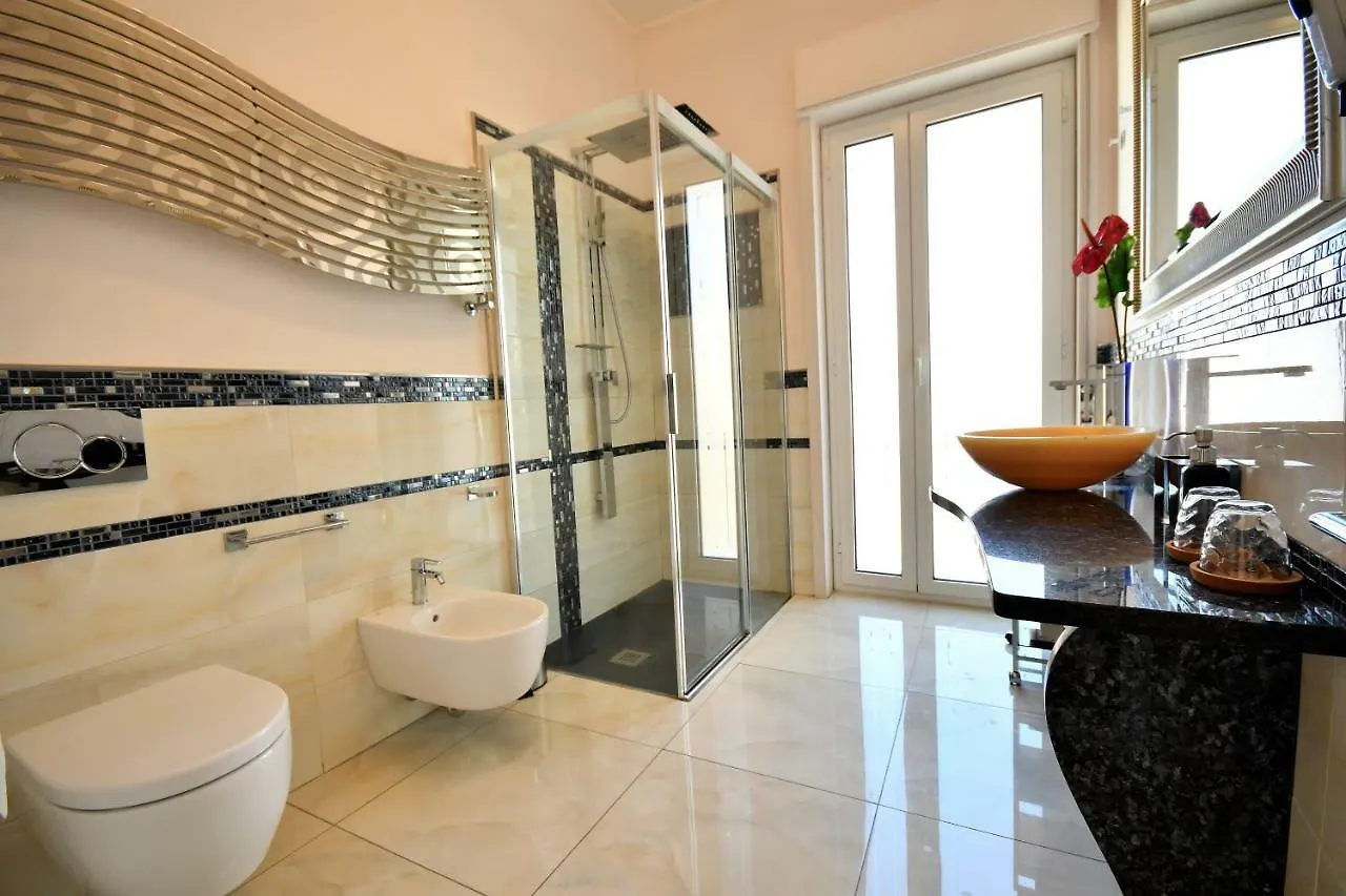 I Due Grifoni Apartments Таормина